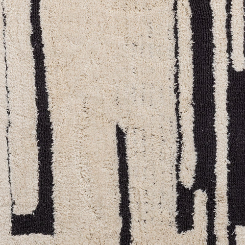 Kombinuje nepravidelné geometrické tvary a línie v kontrastných farbách, čo vytvára moderný umelecký výraz